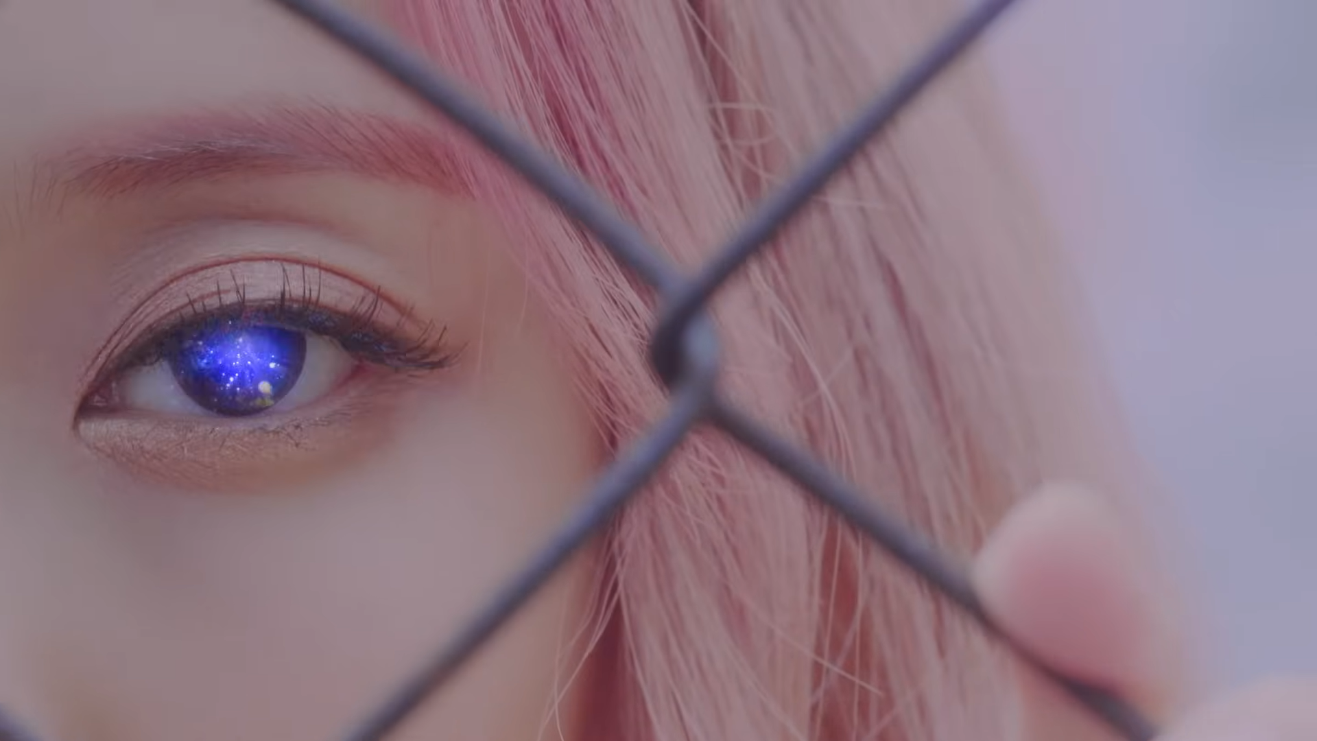 Vivi's left eye glowing purple.